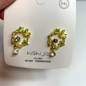 Green and white earrings